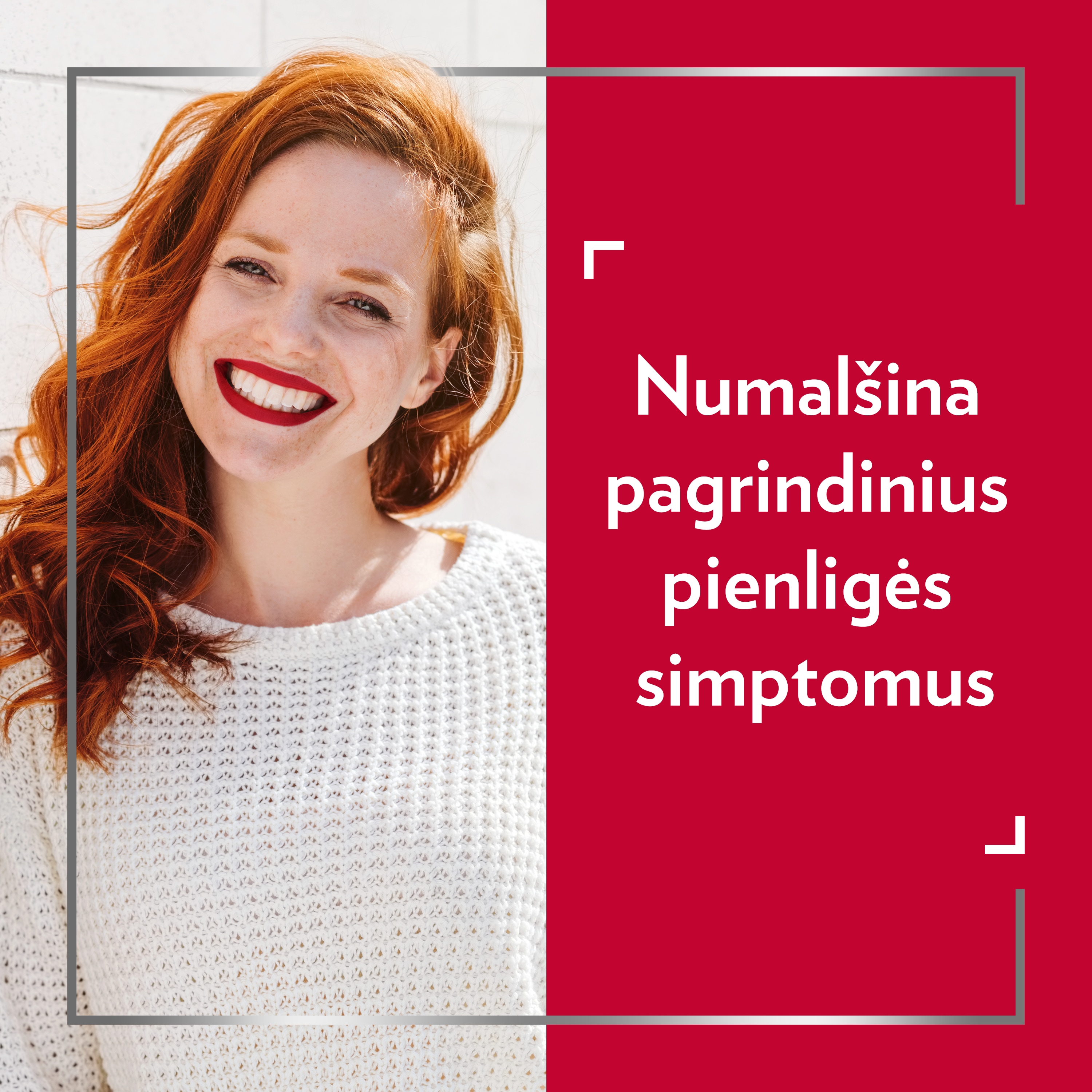 Besišypsanti raudonplaukė moteris.
